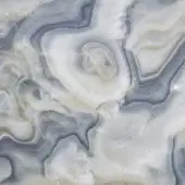 Blue onyx marble texture displaying swirling white and blue patterns, with banded formations and a polished, glossy surface.