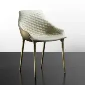 Distinguished Reflex Milady chair with quilted leather upholstery and lustrous Brass tone legs
