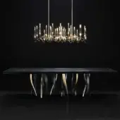 Exceptional Il Pezzo Mancante Il Pezzo 8 table with black stained oak, delicate gold inlays, and sculptural aluminum casting legs