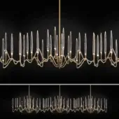 Exceptional Il Pezzo Mancante Il Pezzo 3 chandelier crafted in hand-forged brass with polished finish and clear solid crystal elements