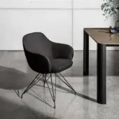 Elegant Sovet Italia Cadira chair with dark charcoal textile upholstery and lacquered metal base