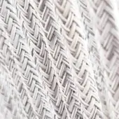 White Tex rope with a dense herringbone weave, displaying a consistent raised texture and subtle tonal variations in diffused light.
