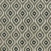 Geometric textile sample features dark green diamonds within beige outlines, a dense woven pattern with visible horizontal and vertical threads.