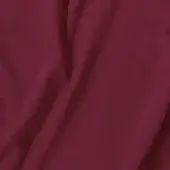 Burgundy fabric swatch with brushed texture, labeled “vismara eco nabuk,” draped to show matte finish and consistent color against a light gray backdrop.