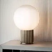 Distinguished Rugiano Liberty table lamp with satin bronze base and milky white glass lampshade