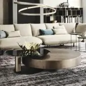 Distinguished Cattelan Italia Arena coffee table with black embossed lacquered steel base and brushed bronze lacquered steel top crafted with clear glass inset