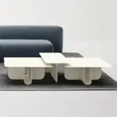 Distinguished LaCividina U coffee table crafted with bent aluminum and matte off-white tabletop exhibiting clean, subtly curved elements