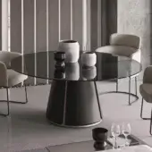 Distinguished Ditre Italia Claire table with circular clear glass and conical recycled bonded leather base in matte dark gray