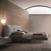 Superior Ditre Italia Papilo bed with plush gray headrest cushions and natural grain wood in a medium-toned brown finish