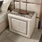 Sophisticated DV Home Collection Adler nightstand crafted in leather with marble tabletop and rose-gold trim exhibiting matt lacquered interiors
