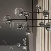 Refined Reflex Bulles XL suspension lamp with intrinsic metal structure in bronze and ten transparent borosilicate glass spheres with shaded sputtering