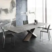 Elegant Cattelan Italia Tyron table with geometric bronze embossed lacquered steel base and Ardesia marmi ceramic top