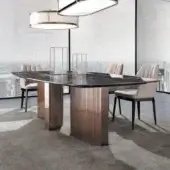 Elegant DV Home Collection Tiffany table with dark glossy marble top and bronze-like stainless steel base