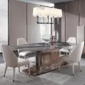 Sophisticated DV Home Collection Windsor table with dark grey and brown marble top and reflective rose-gold stainless steel base