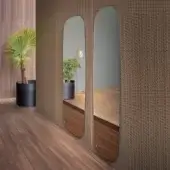 Exceptional Bonaldo Lake mirror with elongated form in warm brown wood and painted bronze metal layering