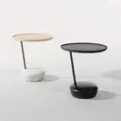 Refined Bonaldo Lupino side table with ash wood tabletop and sleek painted black metal rod supporting a speckled black base