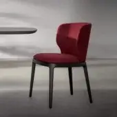 Superior Bonaldo Joy chair with dark red textile upholstery and a solid wood base built with slender legs