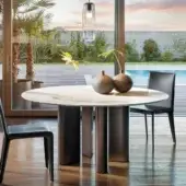 Innovative Bonaldo Geometric table with light cream marble-patterned ceramic top and dark metal teardrop legs
