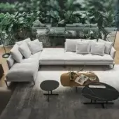 Refined Bonaldo Soft Island sectional with light gray textured textile upholstery and subtle dark metal feet