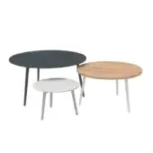 Overlapping circular surfaces with dark stone-like, light wood-like and white finishes on angled, tapered legs against a white backdrop