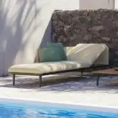 Exceptional Royal Botania Styletto lounge lounger in light beige upholstery with green cushions and dark gray stiletto legs