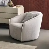 Superior Bonaldo Bodo lounge chair in light gray fabric with a textured matte finish and refined leather accents