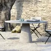 Innovative Royal Botania Conix table with conical base cast in fiber-reinforced Ductal® concrete and polished matte gray top