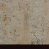 Mottled beige and tan texture with granular surface, dark brown and gray patches, linear markings, and matte finish over a black bar.