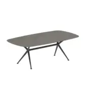 Refined Royal Botania Exes table with light gray ceramic tabletop and sleek black coated aluminum base crafted in a contemporary X-shape