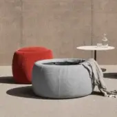 Innovative Royal Botania Tono ottoman with light gray textile and hollow moulded plastic core presents a textured matte surface