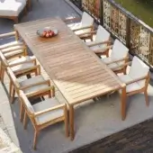 Distinguished Royal Botania U-nite table with natural light brown teak top and base exhibiting a smooth, minimalist finish