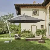 Exceptional Varaschin Copacabana umbrella crafted with aluminum and stainless steel in matte white with a square gray canopy