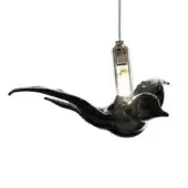Black rondini pendant light, glossy glass, bird-shaped with outstretched wings, silver cord, brushed metal fitting, warm light glow.