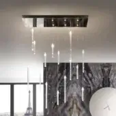 Distinguished Reflex Comete suspension lamp with mirrored glass canopy and illuminated transparent glass rods crafted in Italy