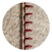 Woven textile featuring a vertical column of red "T" shapes against a light beige background with a subtle textured grain.