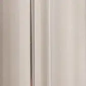Cabinet door with frosted glass panel, white molding, and vertical stainless steel handle, featuring recessed stepped detailing.