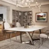 Distinguished Reflex Segno table with a Marmoreflex/Legnoreflex top and wing edge, built with a light metallic sculptural base