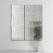 Exclusive Tonelli Design Maybe mirror composed of juxtaposed rectangular panels in silver mirrored finish with geometric lines
