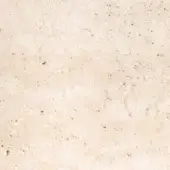 Travertine marble texture displaying light beige and tan tones with irregular pits, creating a smooth yet tactile, porous surface.