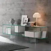 Distinguished Tonelli Design Liber sideboard with transparent glass structure and matt white lacquered wood drawers