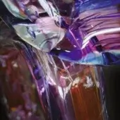 Abstract composition of swirling translucent forms, deep purple and blue hues interwoven with orange, pink, and silver, layered with shimmering iridescent effects.