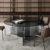 Distinguished Tonelli Design Thrim table with angled glass panels supporting a transparent smoky-tinted glass top