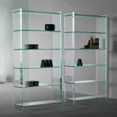 Distinguished Tonelli Design Quiller bookcase crafted in extra clear glass with subtle green toned edges and seamless construction