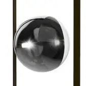 Silver sphere with shaded sputtering suspended between dark brown matte posts, reflecting bright light in a studio setting.