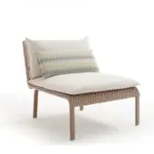 Outdoor lounge chair with woven light brown rope frame, beige cushions, and striped lumbar pillow, on light taupe metal legs.