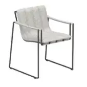 Armchair, light gray fabric, minimalist black metal frame with taut straps; modern, linear design for studio product presentation.