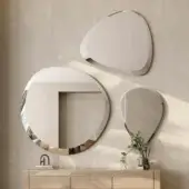 Exceptional Reflex Seventy mirror with irregular shape and beveled edge crafted in extra-clear glass