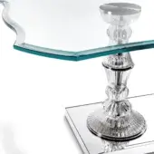 Crystal side table, clear tempered glass top, faceted pedestal base, mirrored square foundation, diamond pattern, reflective surfaces.