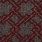 Diamond textile pattern in deep red and gray tones, featuring a dense, raised weave and diagonally oriented geometric motifs.