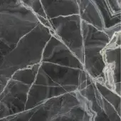 Black onyx texture displaying dark gray stone with white and gold veining in a swirling, polished pattern, creating a dramatic visual contrast.